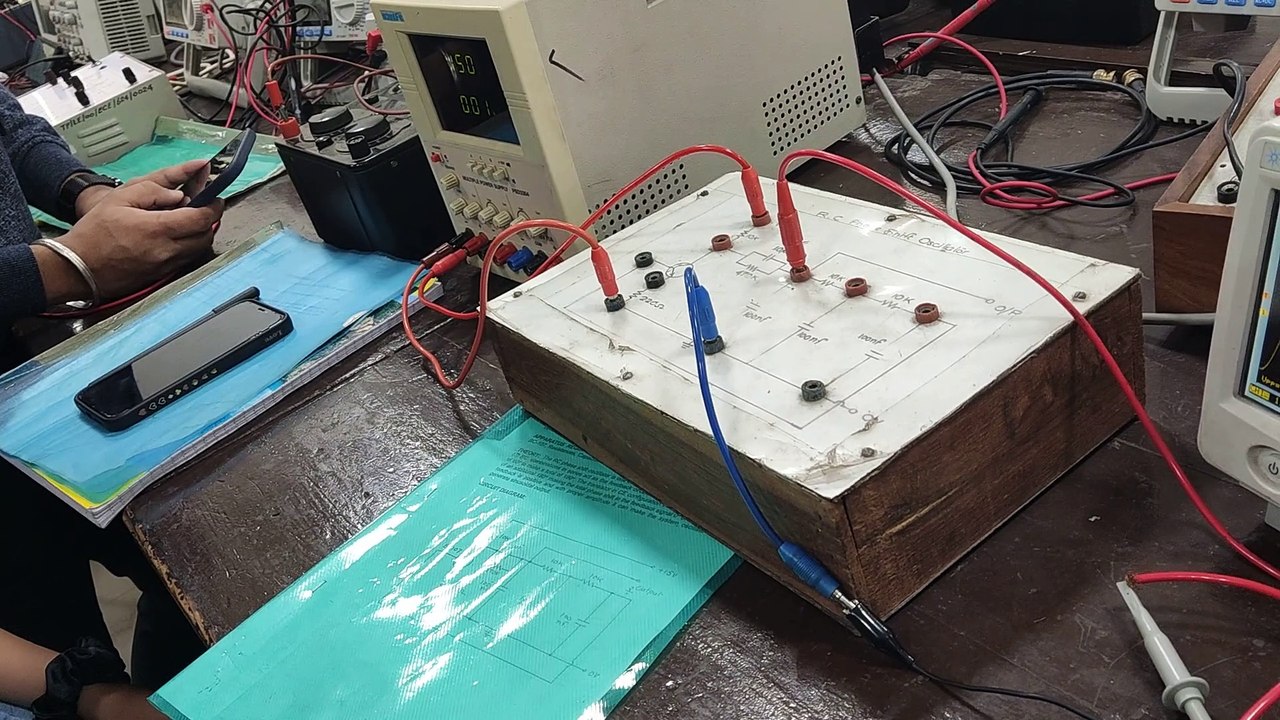 Design and study RC phase shift oscillator. Find the Frequency and compare with calculated frequency.