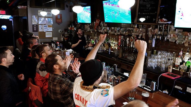 Fans celebrate as England scores six goals against Iran to secure first World Cup win