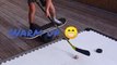 Kid Warms Up With Hockey Stick and Puck While Balancing Himself on Balance Board