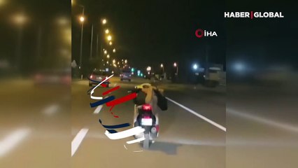 Bu kadarına pes: Yatar vaziyette motosiklet kullandı!