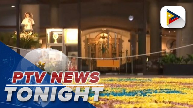 Volunteers create carpet made of hundreds of petals in Marikina