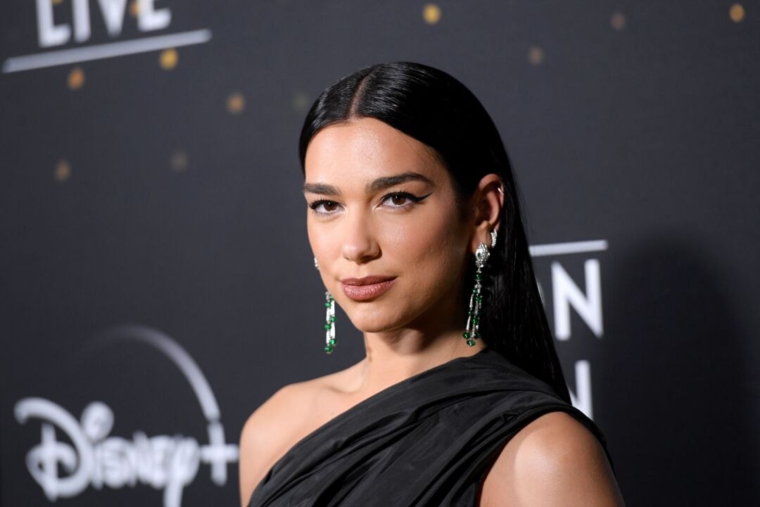 Dua Lipa Wore a One-Shoulder Gown With Opera Gloves and the Most Dramatic Train