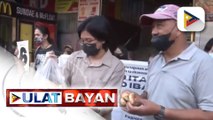 Grupo ng kabataan, namigay ng pandesal sa mga manggagawa na papasok sa trabaho sa Divisoria, Maynila
