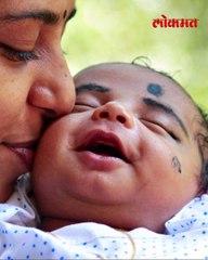 सहा दिवसाच्या बाळाला वाचवण्यासाठी  एका हाताने अधू असलेल्या वडिलांची  बिबट्याशी झुंज-