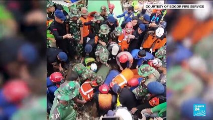 'Miracle' rescue of child trapped by Indonesia quake
