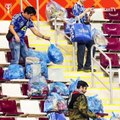Why do Japanese fans clean the stadium?
