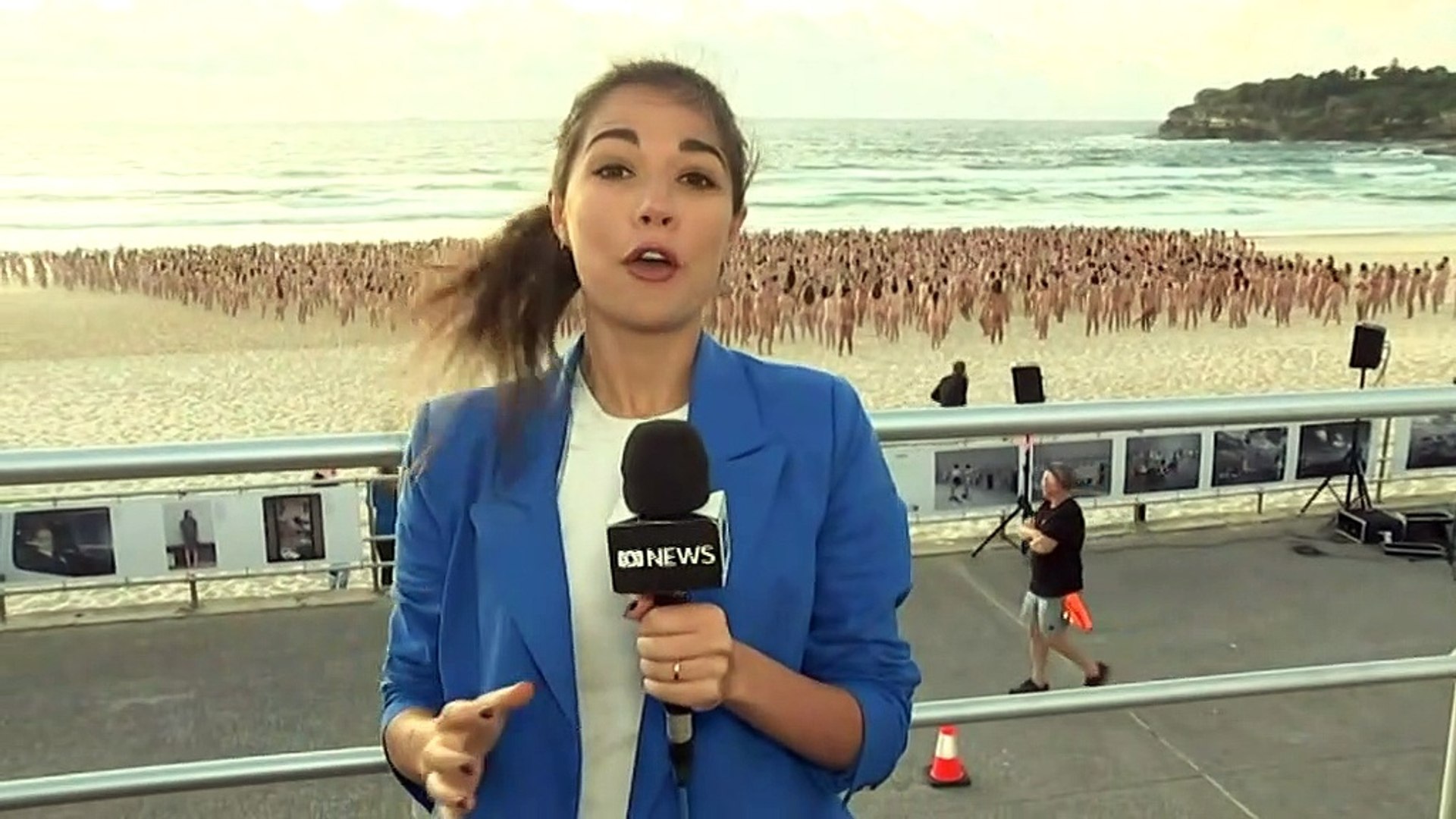 Thousands take part in Spencer Tunicks nude installation on Bondi Beach image