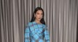 Dua Lipa Wore a Plaid Dress in the Most Underrated Christmas Color