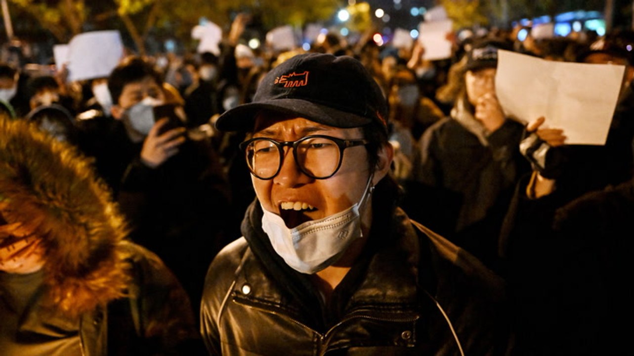 Thousands of demonstrators erupt in rare protests against COVID-19 restrictions across China