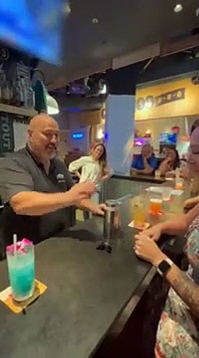 Bartender impresses women with his magic tricks