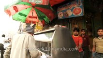 Deliciously eating a Chole bhature on a stand - Chandni Chowk Old delhi