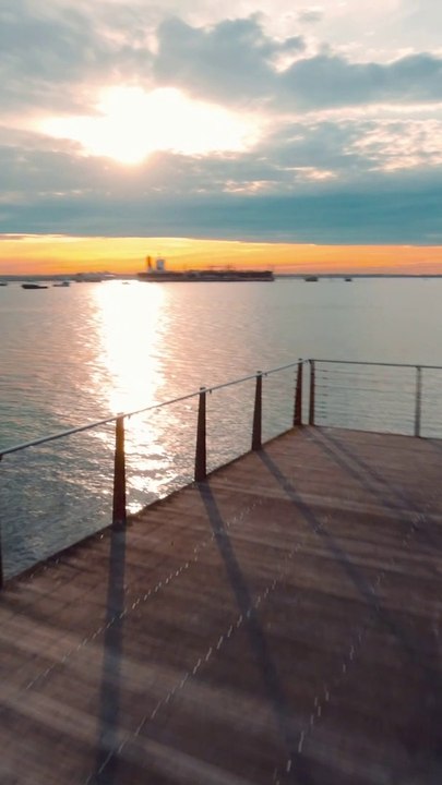 Sunset from a pier. Drone view of a sunset from a pier in Australia. Travel Adventures Australia.
