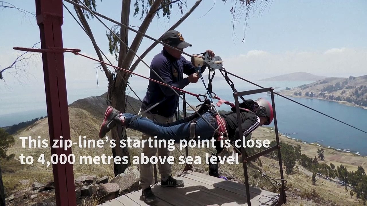 Adrenaline junkies take in Bolivia's Titicaca Lake from up high