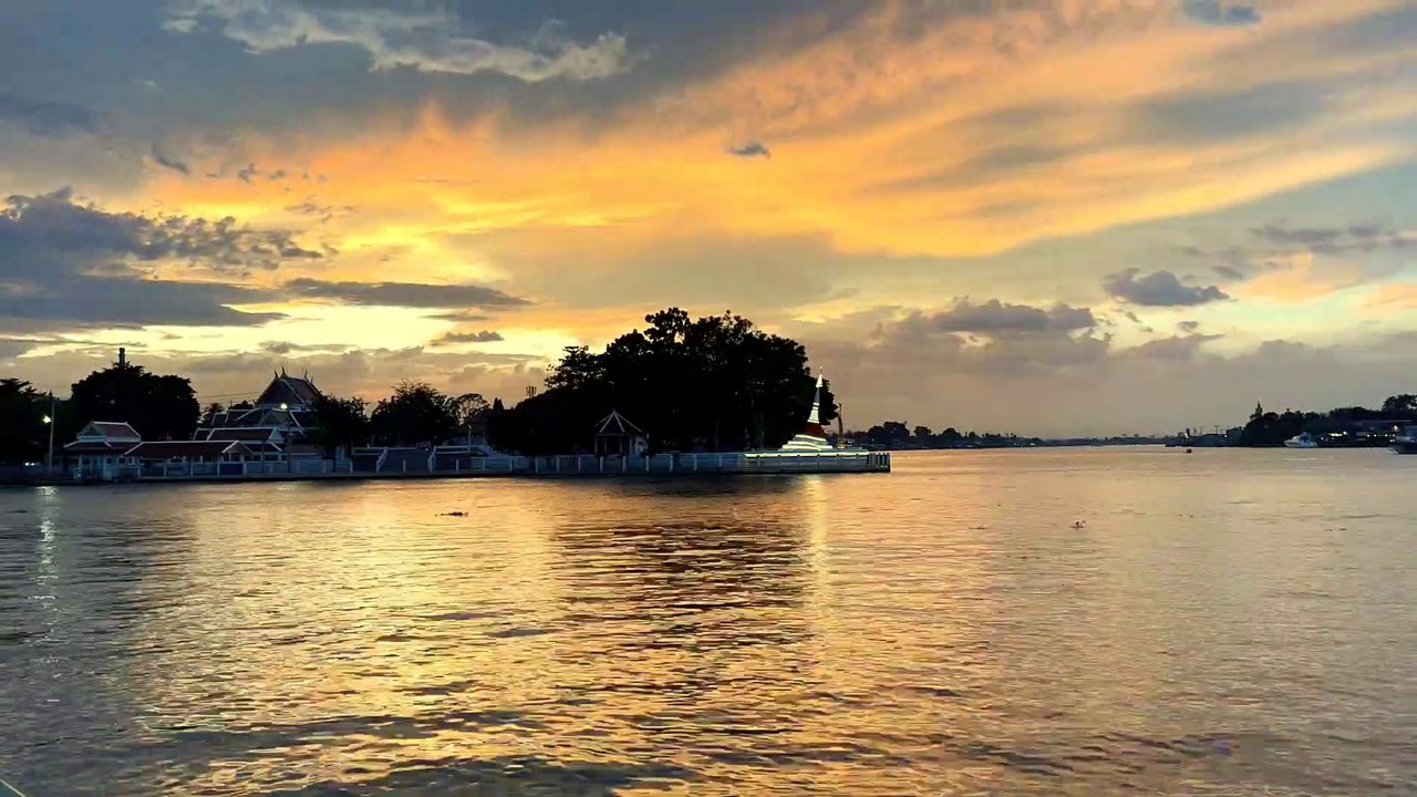 Sunset at Koh Kret Chao Phraya river Thailand