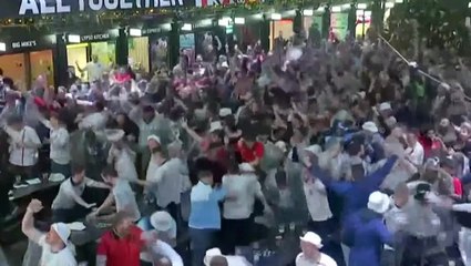England fans celebrate third goal against Wales in World Cup match
