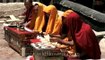 Monks chanting prayers during a Buddhist religious ceremony in Leh