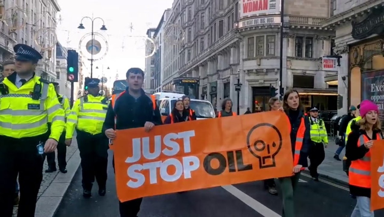 Just Stop Oil protesters slow traffic on march from Moorgate to London Wall