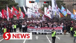 South Korean workers rally in support of truckers