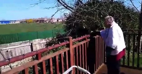 Care home resident Maggie Winters cheering on Farringdon Academy football team