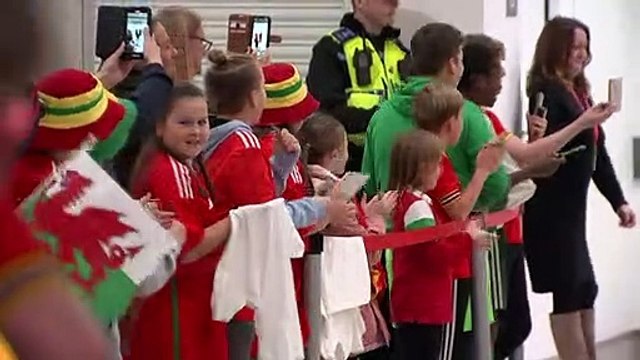 Wales’ footballers warmly welcomed home by fans