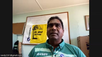 KITEBOARDERS RIDING THE WAVES