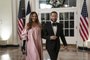 Pregnant Chrissy Teigen Shows Baby Bump in Pink Off-the-Shoulder Gown at White House State Dinner