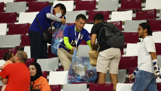 Japan fans keep up tidy tradition after surprise World Cup win over Spain