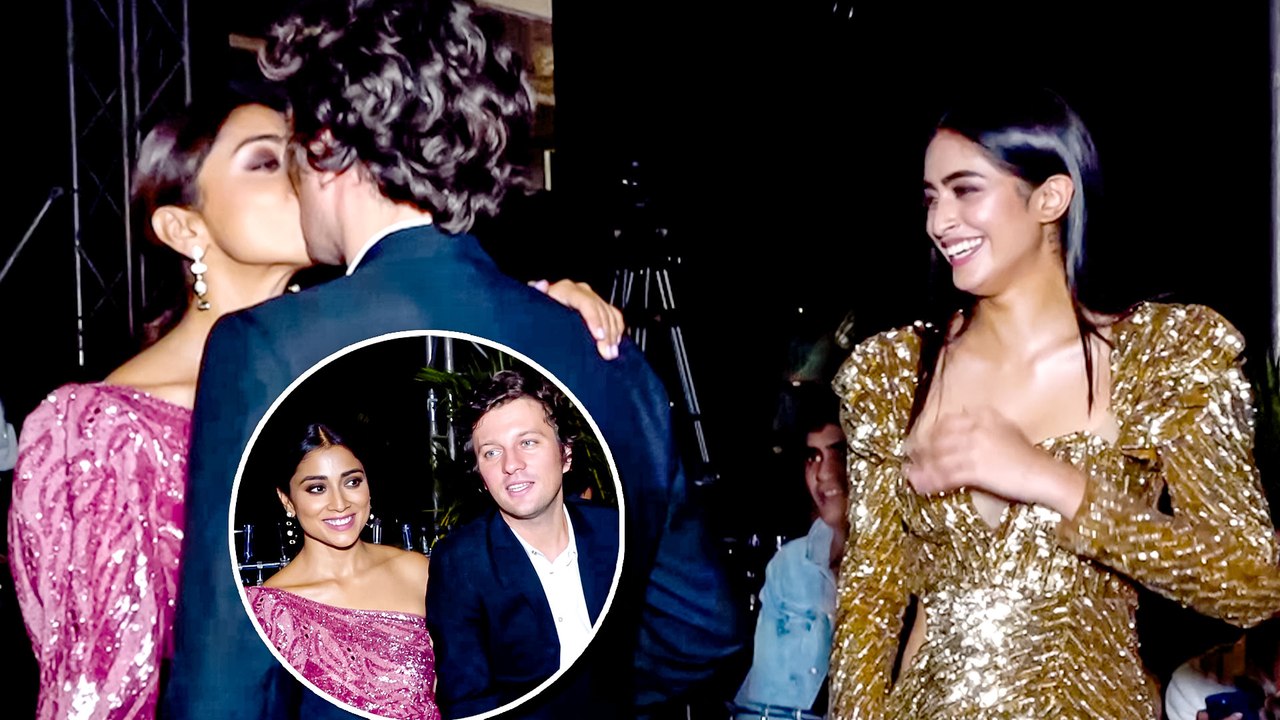 Cute! Shriya Saran Steals Kiss From Hubby At An Event