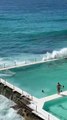 Wave Hits Swimming Pool