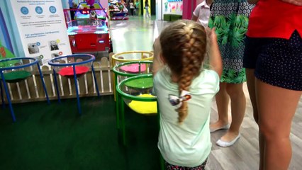 Roma and Diana playing with colored sand