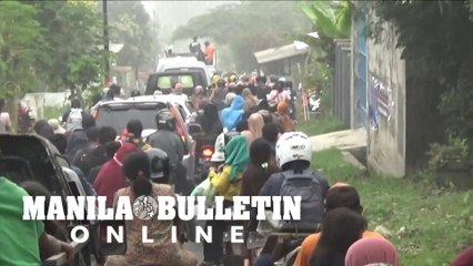Indonesia villagers race to escape eruption as sky turns black