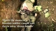Moment Russian soldier catches and throws away Ukrainian 'drone bombs