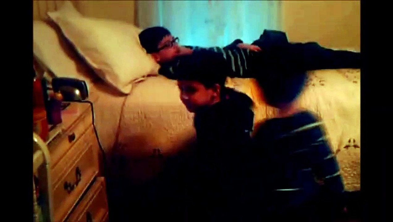 Christopher & Anthony wrestle while Jonathan watches tv