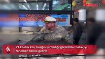 77 kiloluk kılıç balığını sırtladığı görüntüler balıkçıyı fenomen haline getirdi