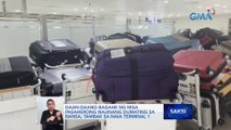Daan-daang bagahe ng mga pasaherong naunang dumating sa bansa, tambak sa NAIA Terminal 1 | Saksi