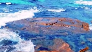 Uber Chill Beach Drone View Over A Pier in Central Coast NSW Australia. Travel Adventures Australia.
