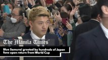 Blue Samurai greeted by hundreds of Japan fans upon return from World Cup