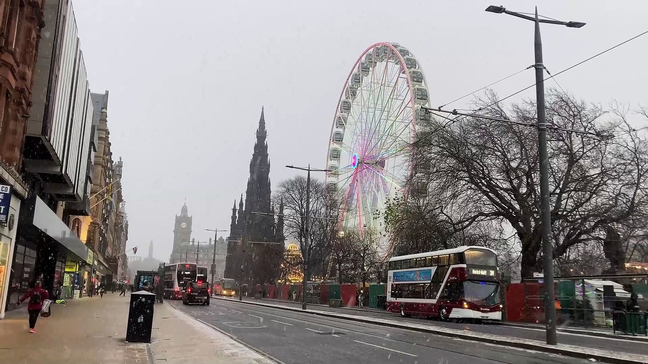 Snow is falling in Edinburgh