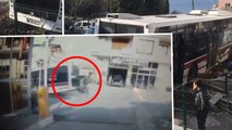 İzmir'de el freni çekilmeyen otobüsü eliyle durdurmaya çalıştı... Korku dolu anlar kamerada