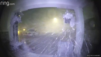 Ring Camera Catches Trampoline Flying Over House Hitting Trucks