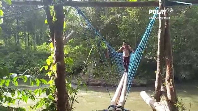 Polres Pulau Buru Polda Maluku Pengamanan TPS Melewati Jalanan Terjal