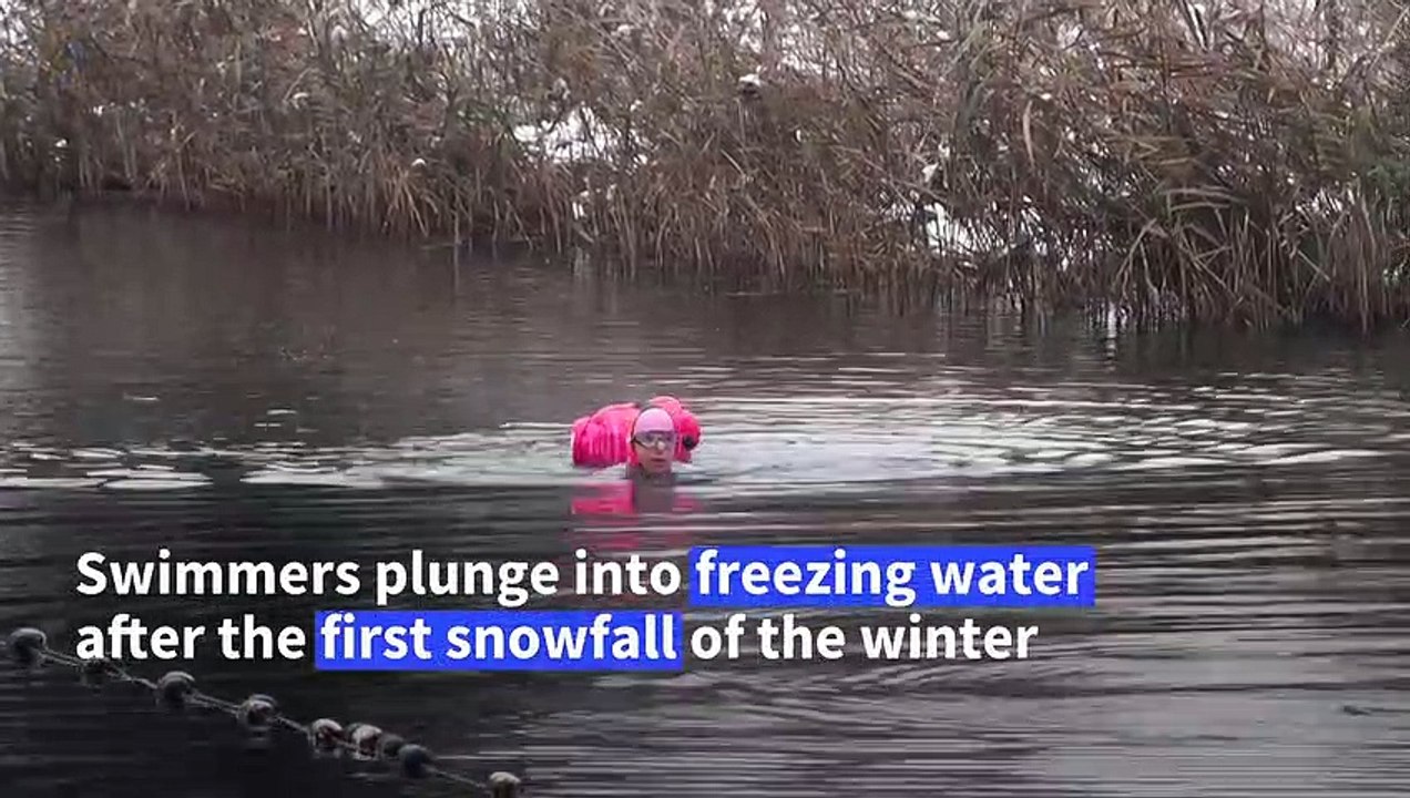 Outdoor swimmers brave near-freezing water as s...