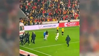 Turkey fan hits goalkeeper with rod