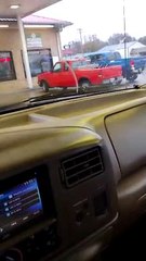 Girl Reacting to Shifter in Truck Breaking at Gas Station