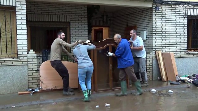 People in Europe and US deal with floods, tornadoes, delayed flights and snow