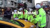 Polise böyle dil döktü... Taksim'de taksimetre açmayan ve pazarlık yapan taksicilere ceza yağdı!