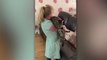 Adorable moment young girl reunited with cat that was missing for year