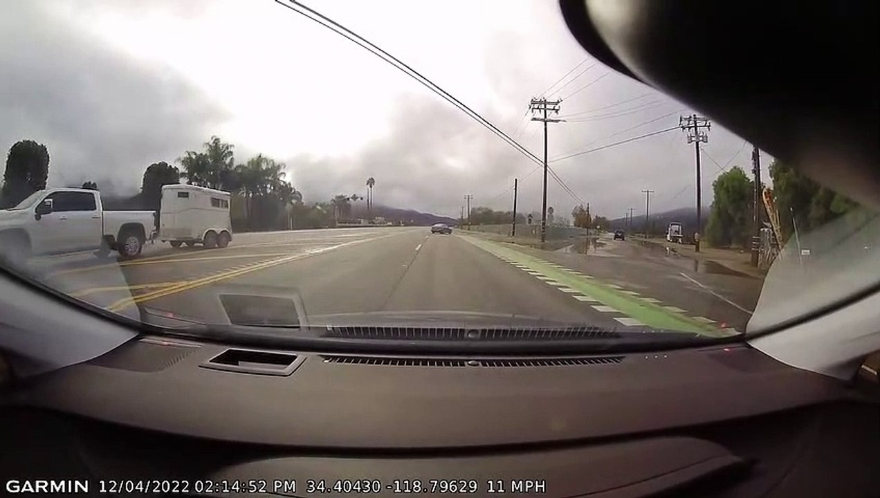 Careless Pickup Driver Collides with Sedan