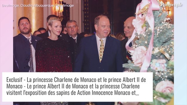 Charlene de Monaco souriante au bras d'Albert, prince tendre et facétieux