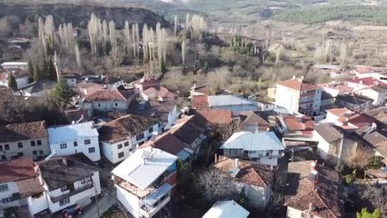Fotoğraf tutkunlarının mekanı köy beyaza boyandı